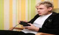excited young adult playing videogame